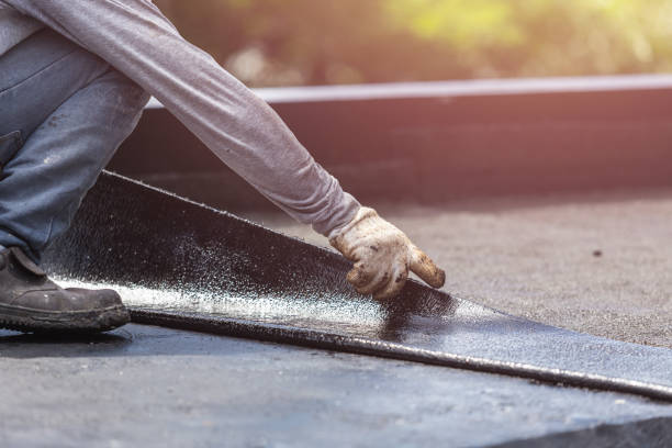 Professional Basement Waterproofing technician working in Brentwood, PA